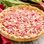 Rhubarb Custard Pie on table with red napkin
